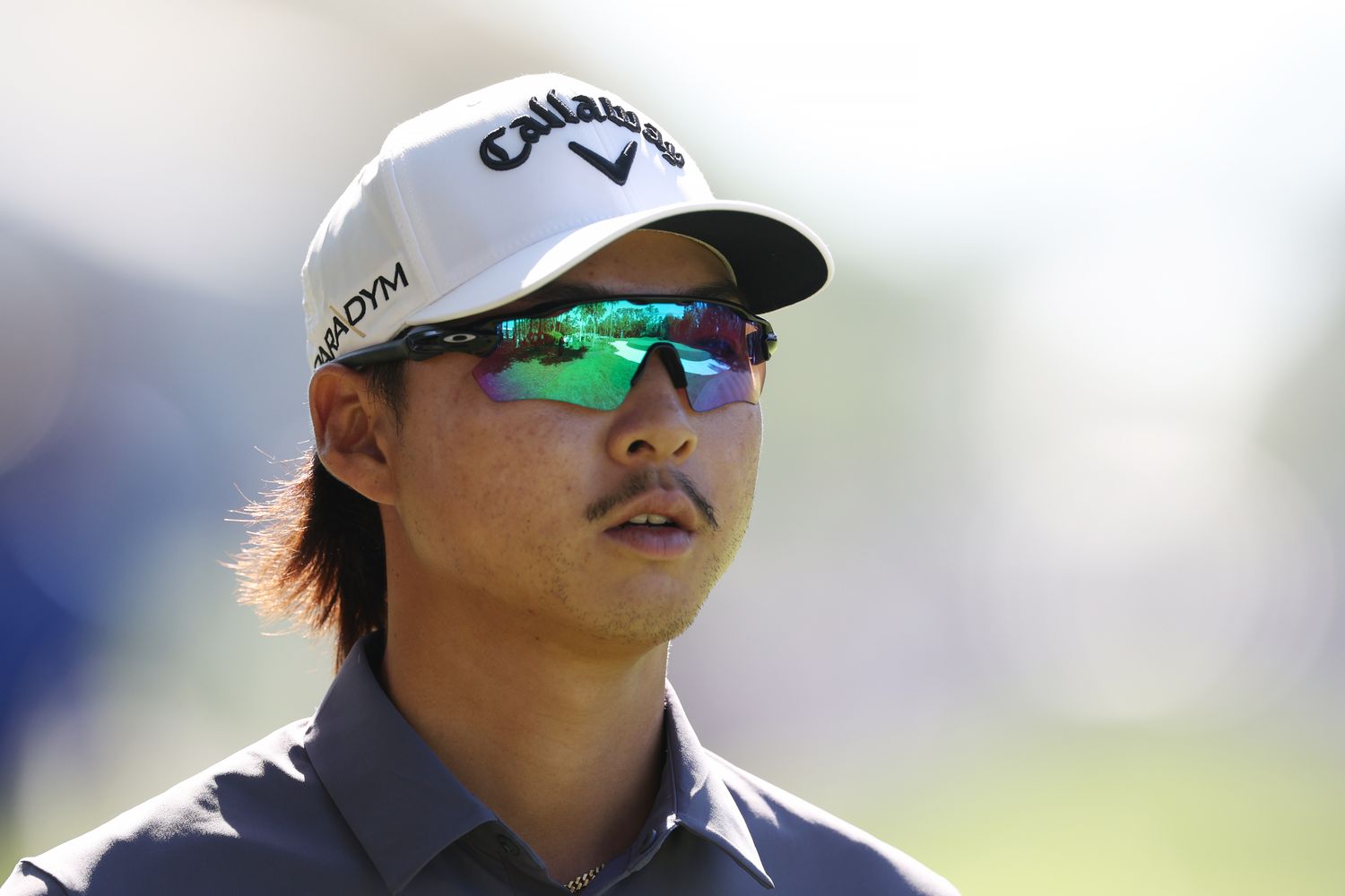 Min Woo Lee of Australia looks on during the third round of the Players Championship.